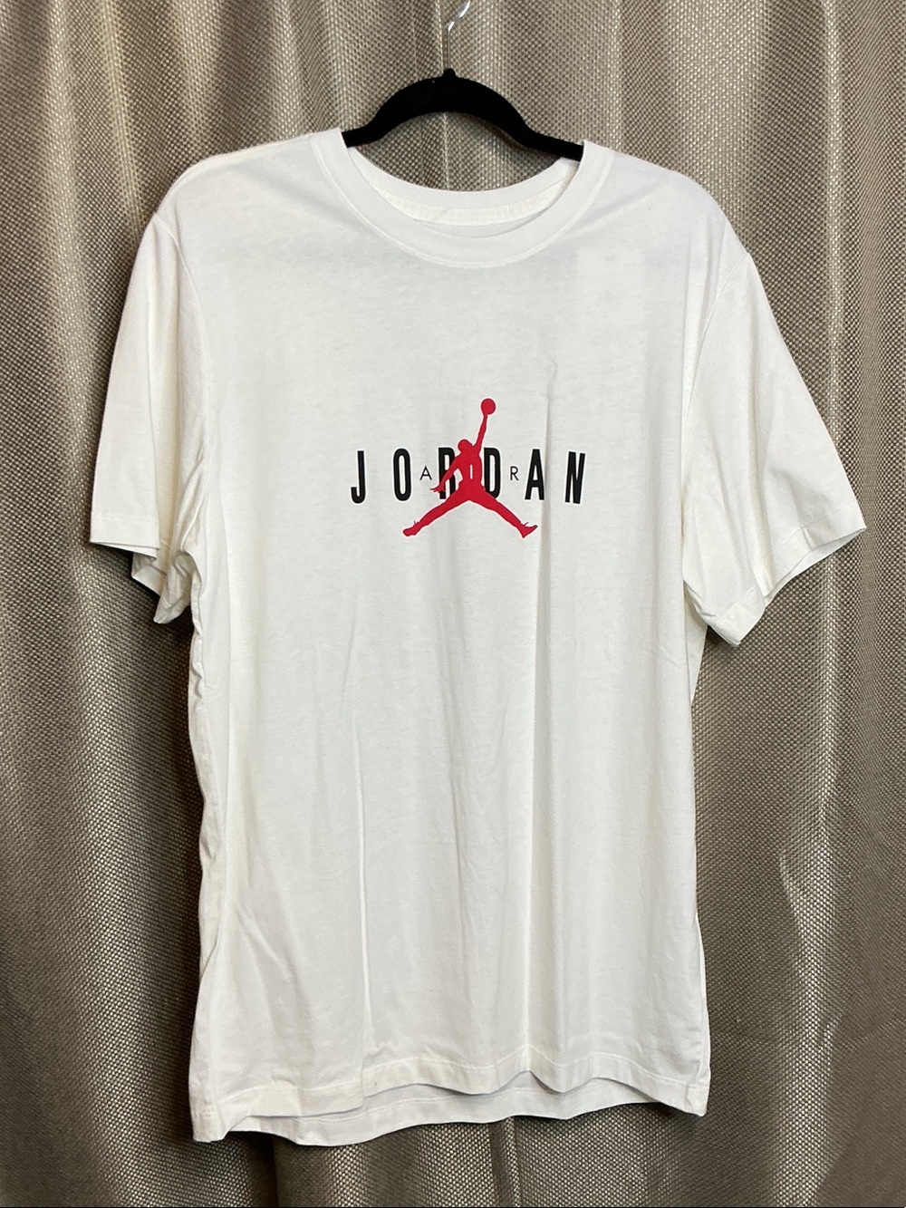 Jordan White Short Sleeve Tee with Red Jumpman and Black Lettering